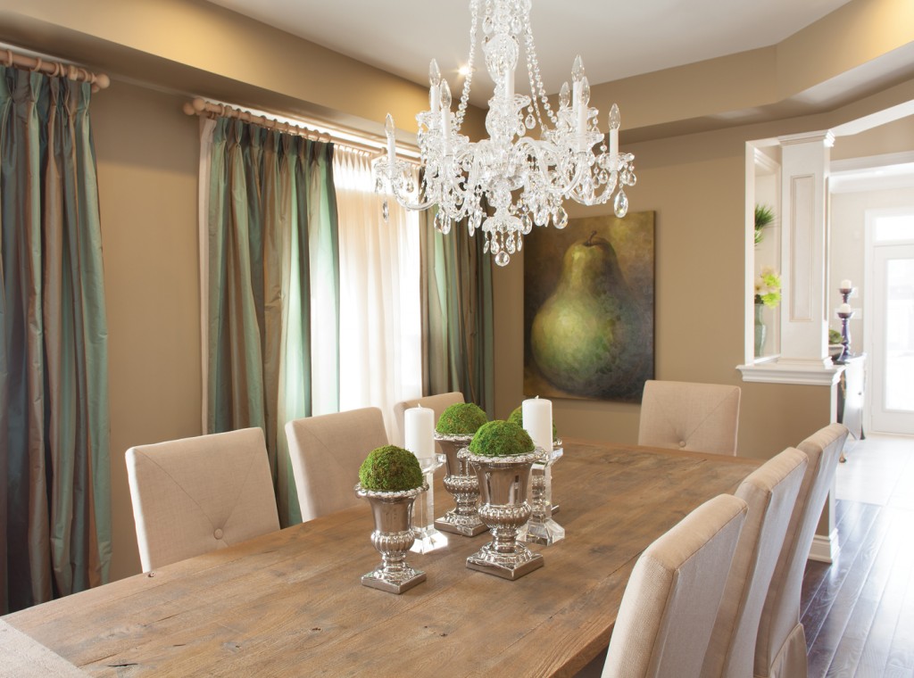 The drapes in this Cardinal Point model home add a dramatic effect to the Dining Room.