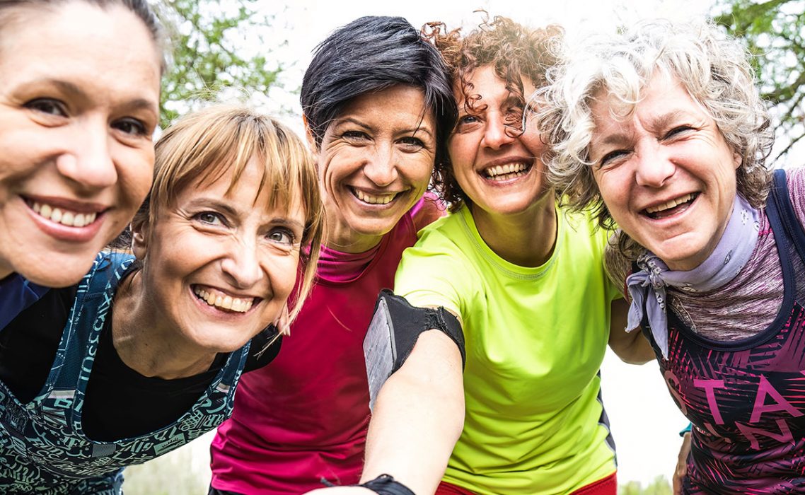 mature-women-group-huddle
